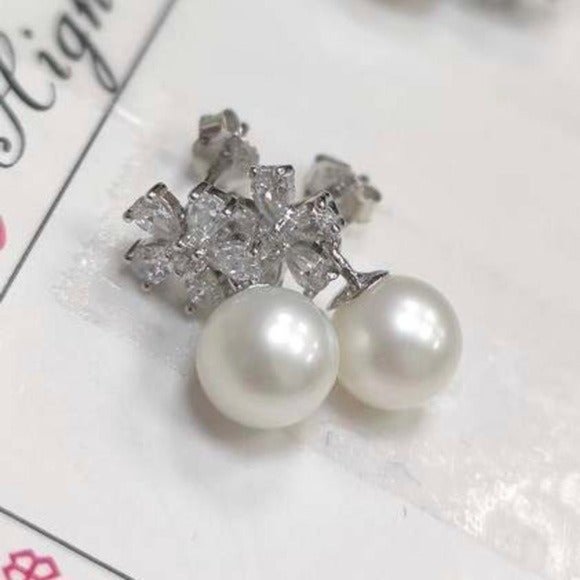 925S Flower Shape Stud Earrings With Round Natural Pearl And Zirconia - Picture 8 of 16